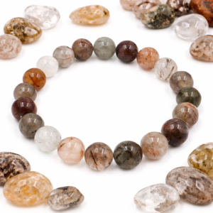 An elegant gardenia bracelet crafted from multicolored beads, each showcasing unique metallic inclusions and delicate rutile needles in varying shades and concentrations. The natural variations create a refined, harmonious design that gives the bracelet a distinctly premium and sophisticated character.